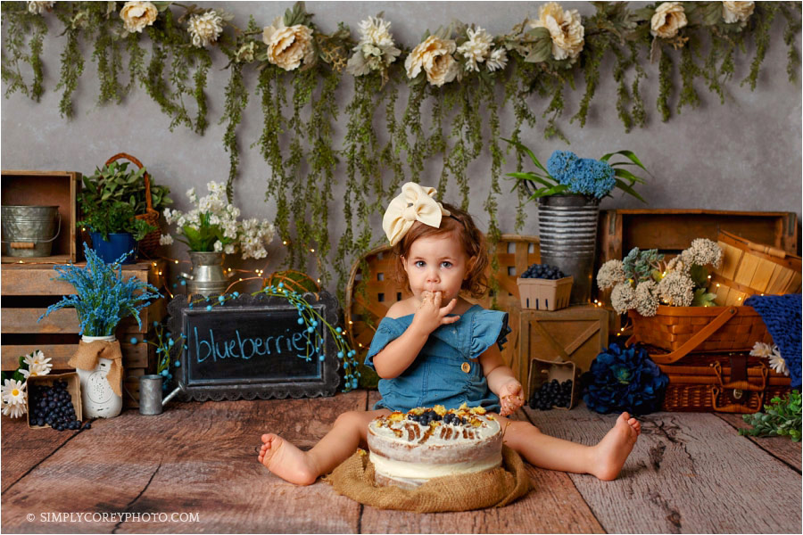 Carrollton cake smash photographer, baby with blueberry cake in studio