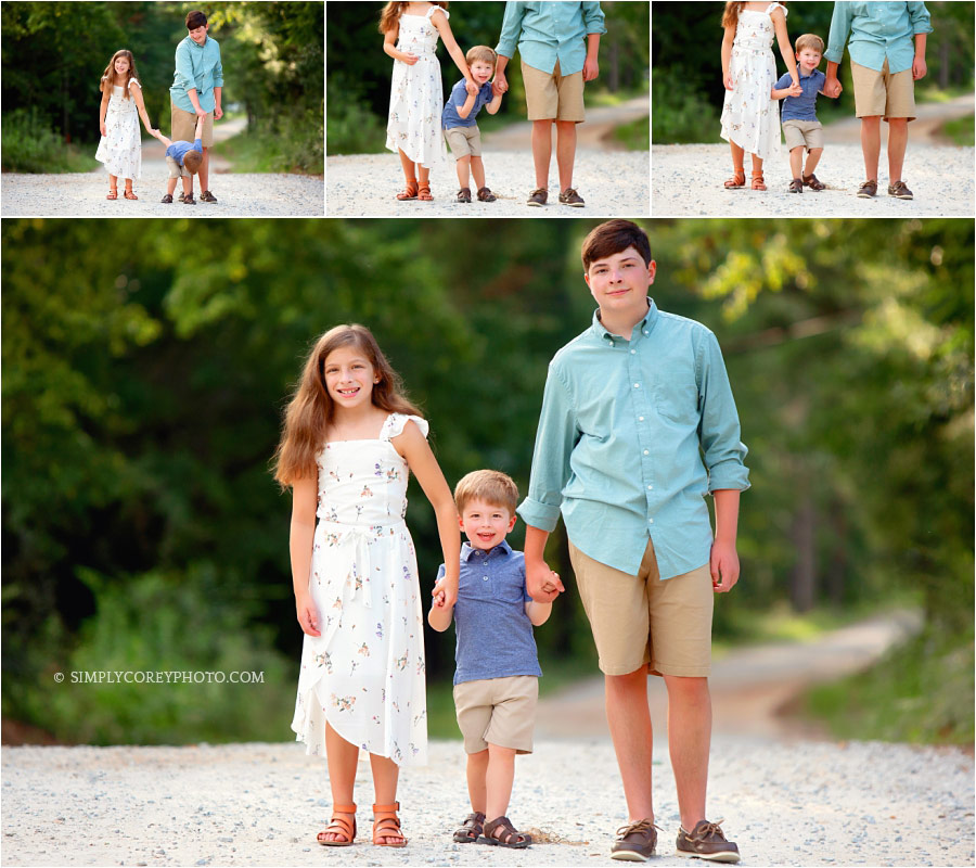 family photographer Douglasville, siblings holding hands outside