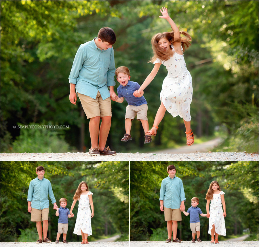 Villa Rica family photographer, siblings jumping on a country road