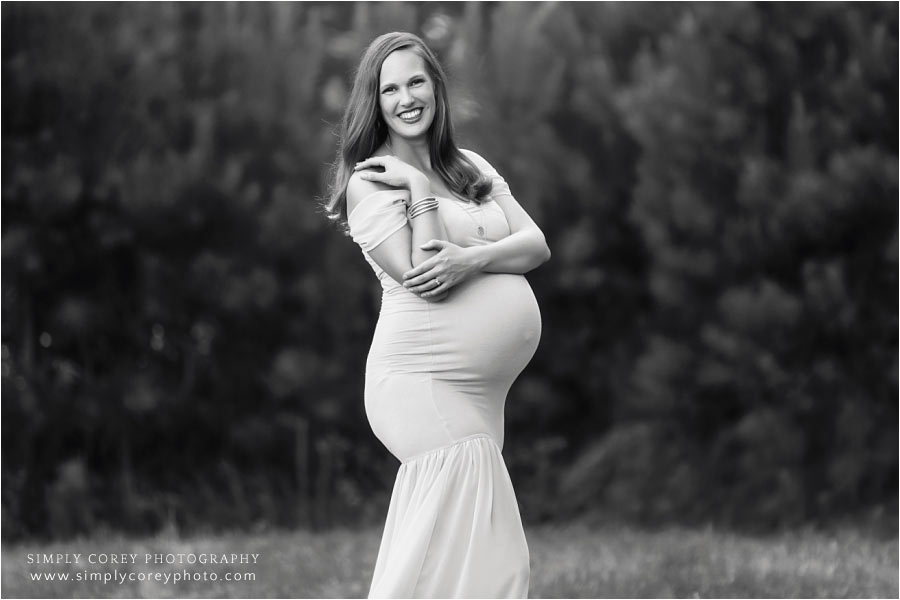 Maternity photographer West Georgia, pregnant mom outside in black and white