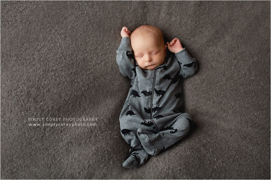 Atlanta newborn photographer, baby in dinosaur sleeper