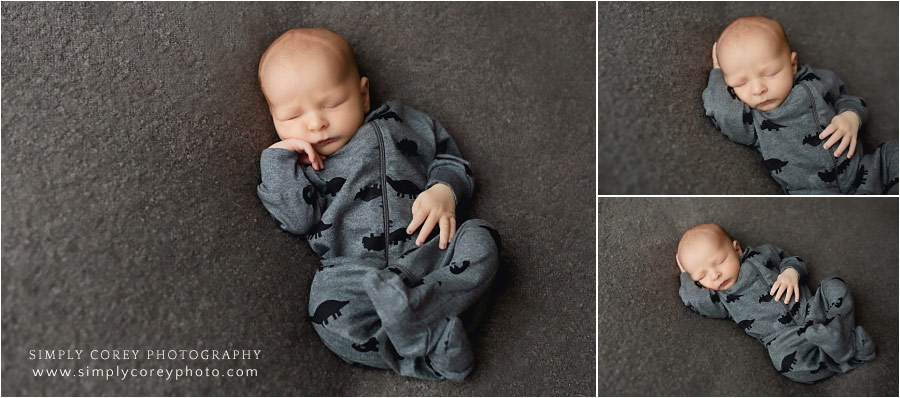 Bremen newborn photographer, baby boy in dinosaur sleeper