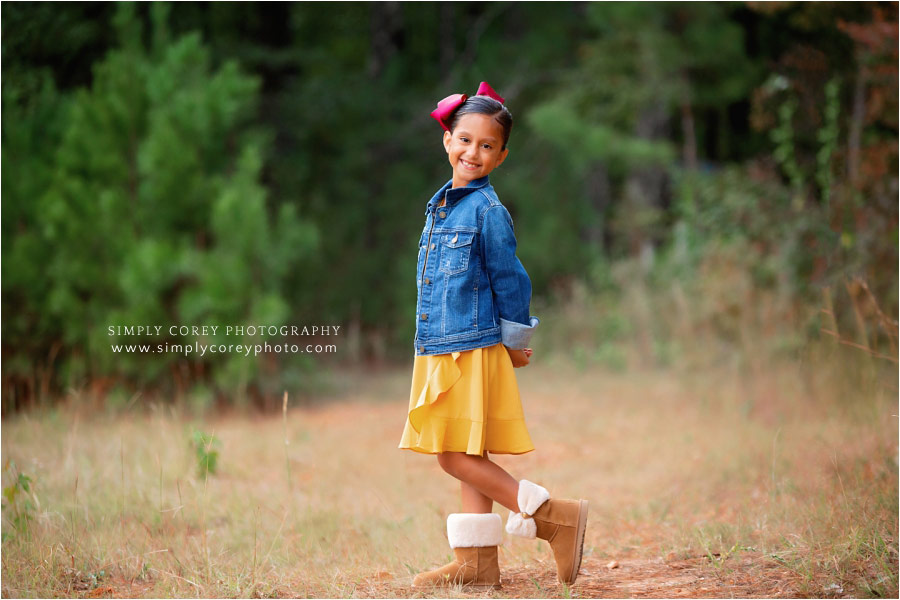Villa Rica kids photographer, girl in jean jacket during a fall session