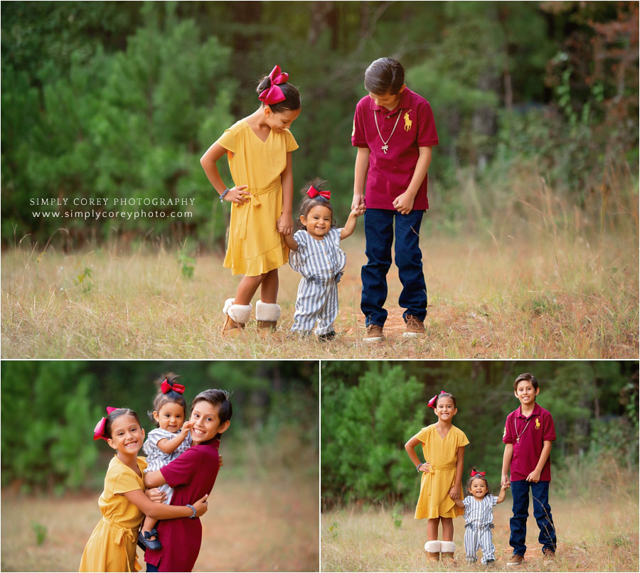 West Georgia family photographer, kids with baby sister outside