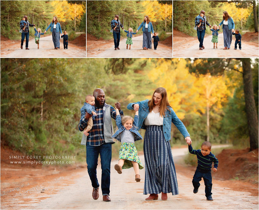 Douglasville family photography, parents with kids and baby on a country road