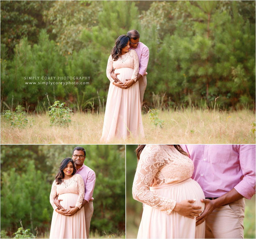 Carrollton maternity photographer, couple in pink outside in a field