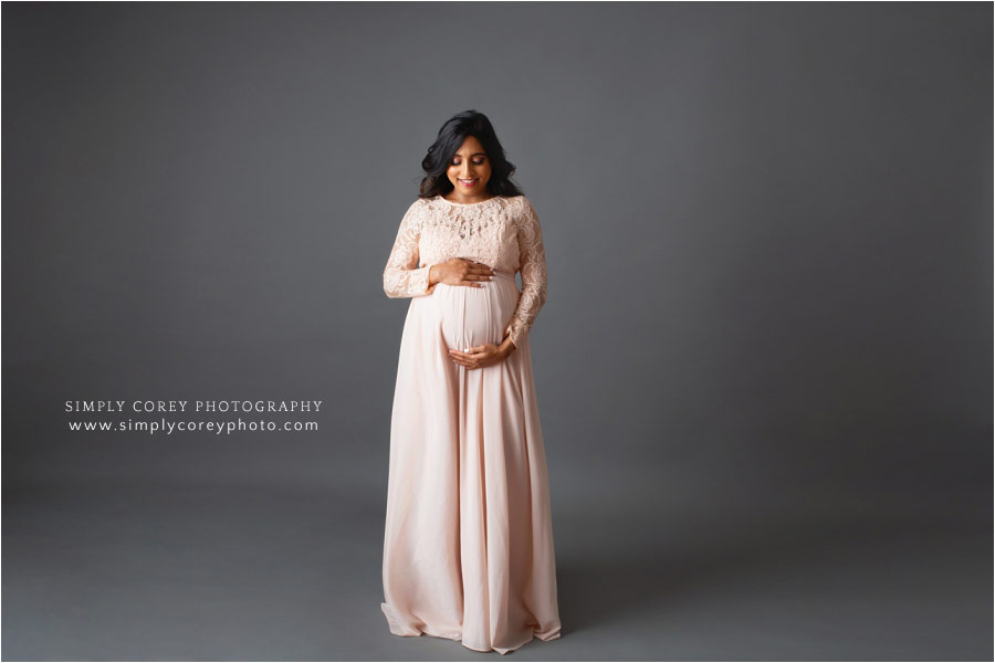 Douglasville photographer, studio maternity session in blush dress on gray