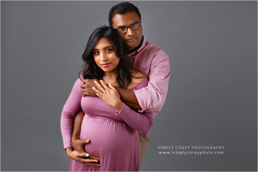 West Georgia maternity photographer, studio session with pink on grey backdrop