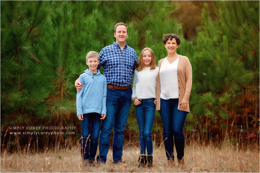family photographer near Douglasville, fall mini by pine trees