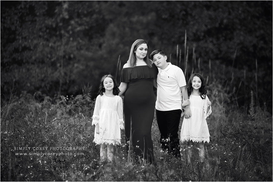 Newnan family photographer, mom and kids during outdoor maternity session