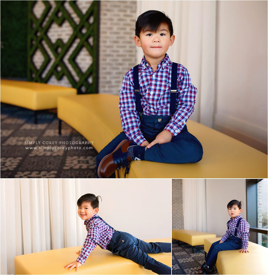 Douglasville children's photographer, child on yellow bench in Atlanta hotel