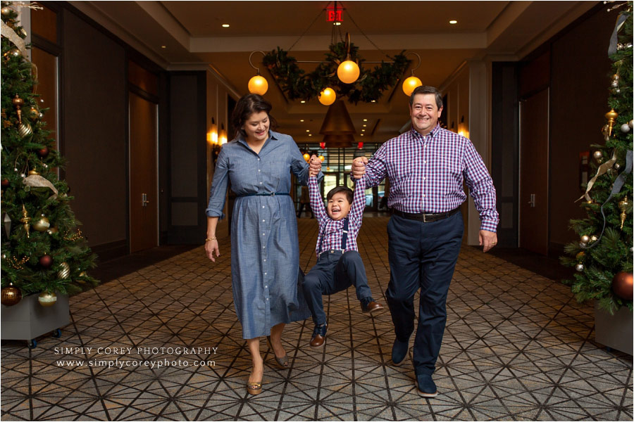 Newnan family photographer, fun Christmas portrait at Avalon Hotel