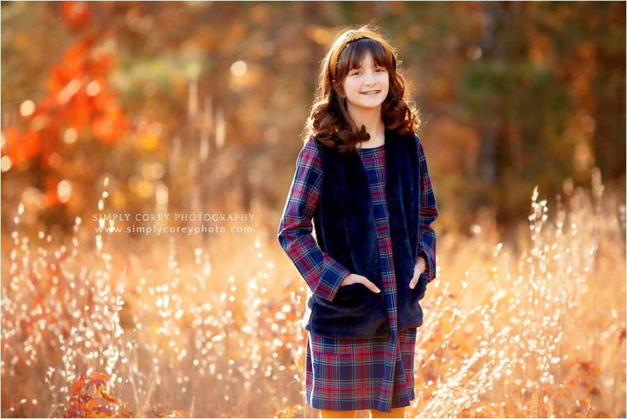 Atlanta children's photographer, child in fall field in golden hour