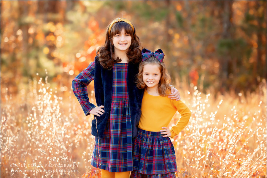 Carrollton family photographer, kids in a golden fall field