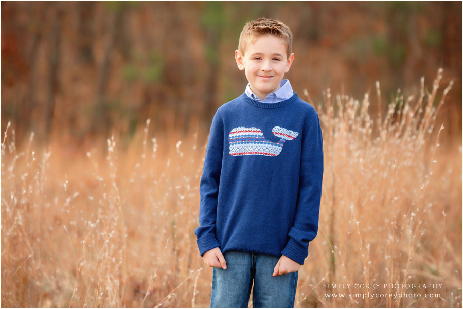 Newnan children's photographer, child outside in whale sweater