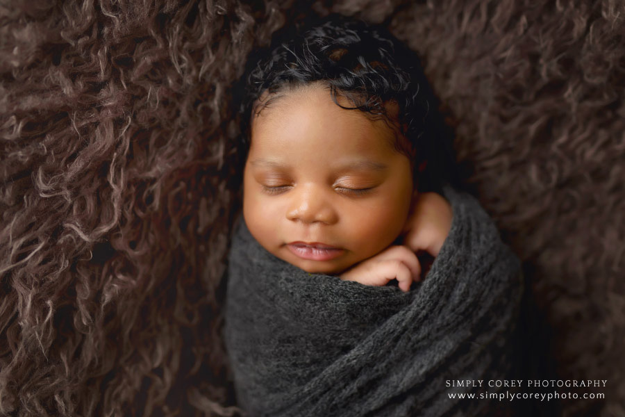 Atlanta newborn photographer, baby boy swaddled in gray wrap