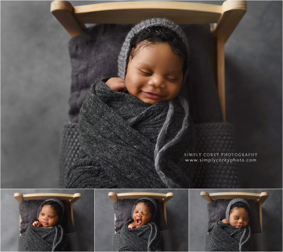 Douglasville newborn photographer, baby boy in grey on little bed