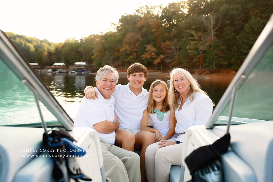 Atlanta lifestyle photographer, family of four on a boat at Lake Lanier
