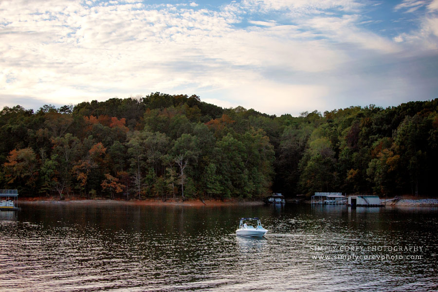 West Georgia lifestyle photographer, family on a boat at Lake Lanier in fall