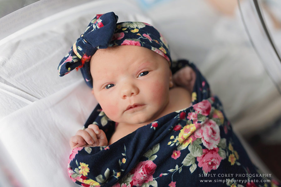 Atlanta Fresh 48 photographer, newborn girl in navy floral wrap and bow