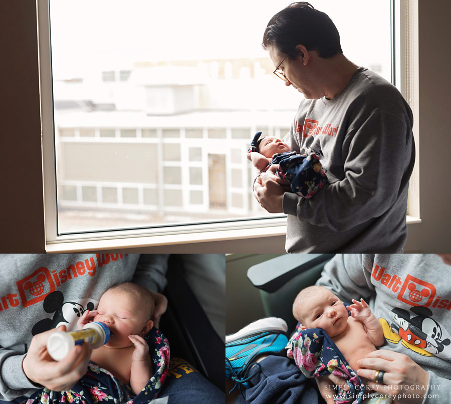 Bremen lifestyle photographer, dad holding baby in hospital Fresh 48 session