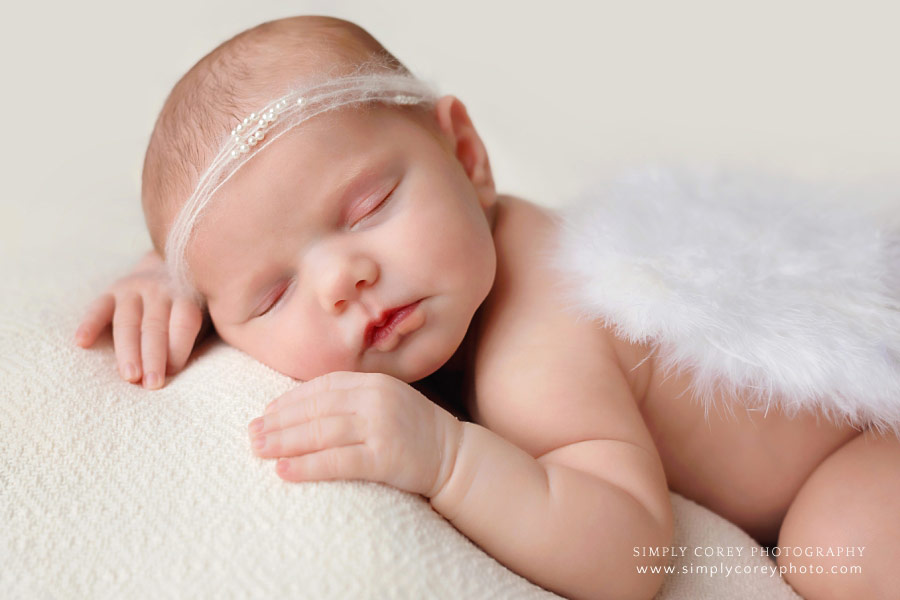Carrollton newborn photographer, baby girl in angel wings and halo