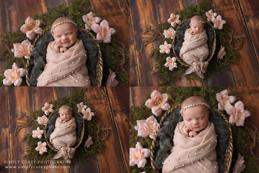 newborn photographer near Carrollton, Georgia; baby in basket with flowers