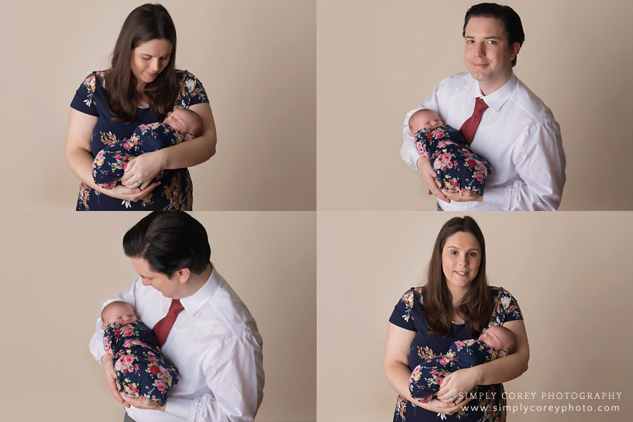 Atlanta family photographer, parents with newborn baby on studio backdrop