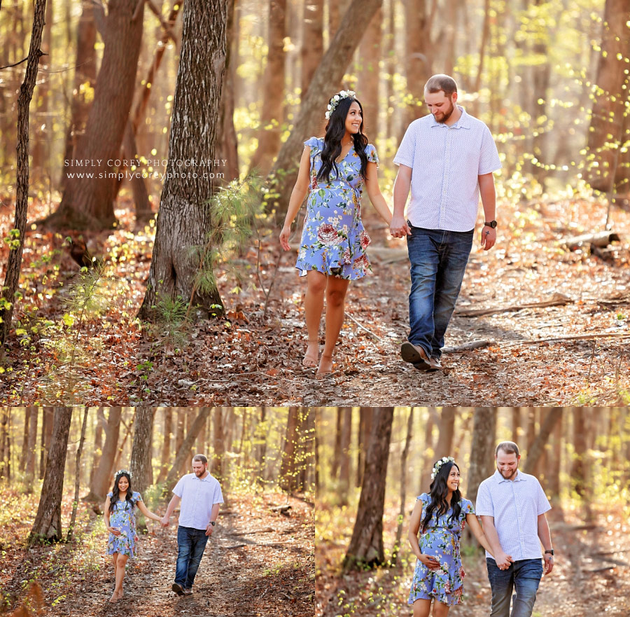 Atlanta maternity photographer, couple outside walking in woods