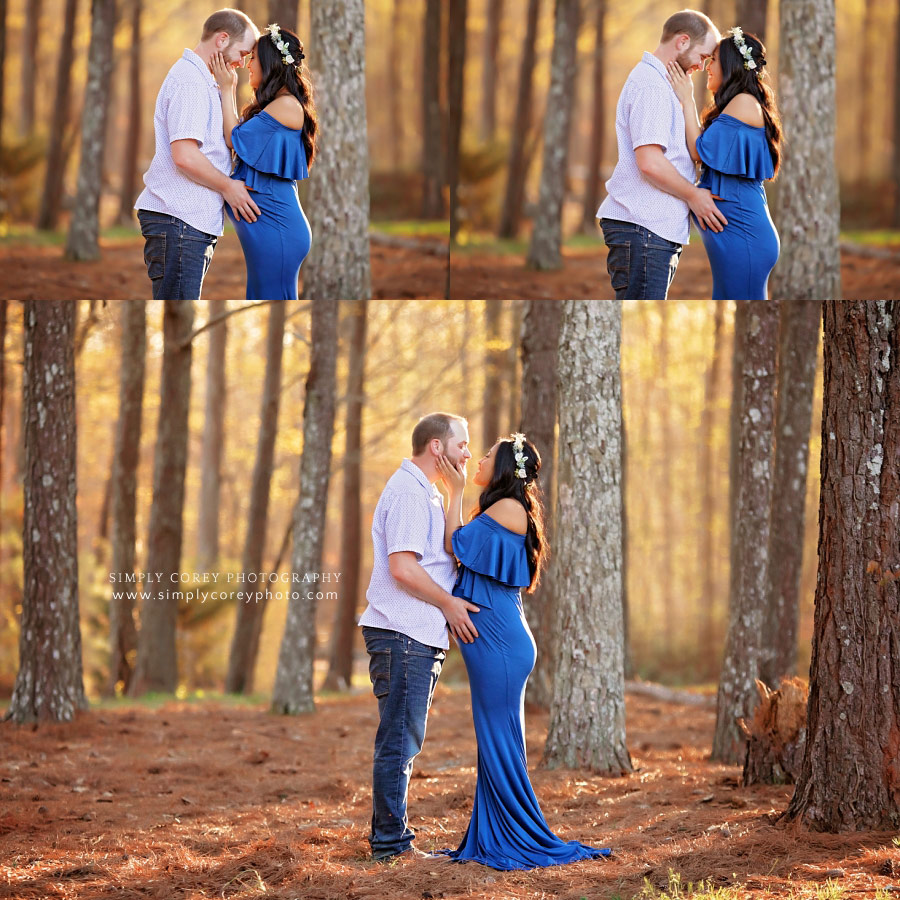 Peachtree City maternity photographer, couple in blue outside by trees
