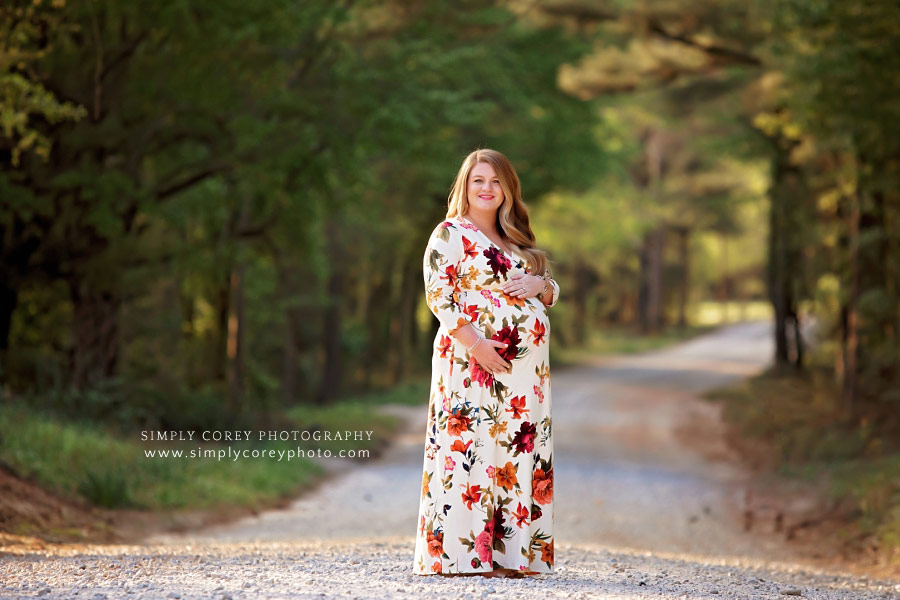 Douglasville maternity photographer, mom expecting twins in floral dress