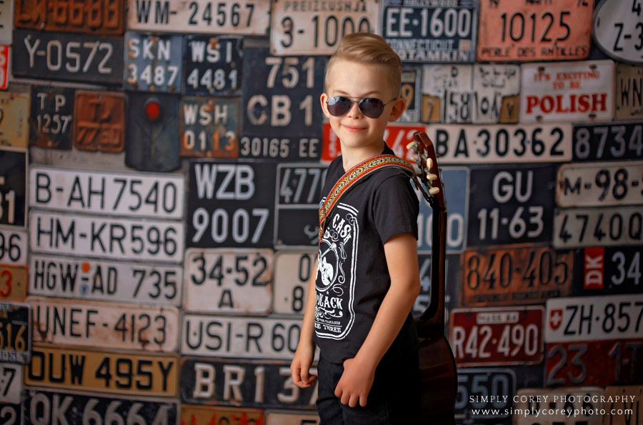 Douglasville photographer, child in Johnny Cash shirt and sunglasses in studio