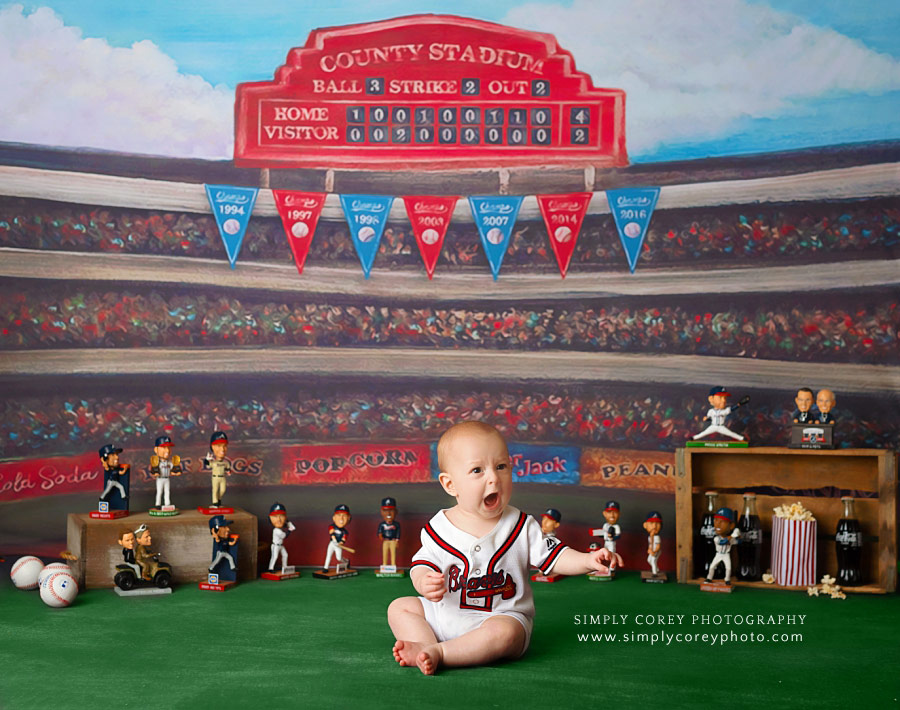 Douglasville baby photographer, baseball theme with Atlanta Braves bobbleheads