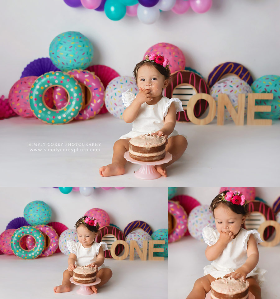 Peachtree City baby photographer, girl eating at cake smash session