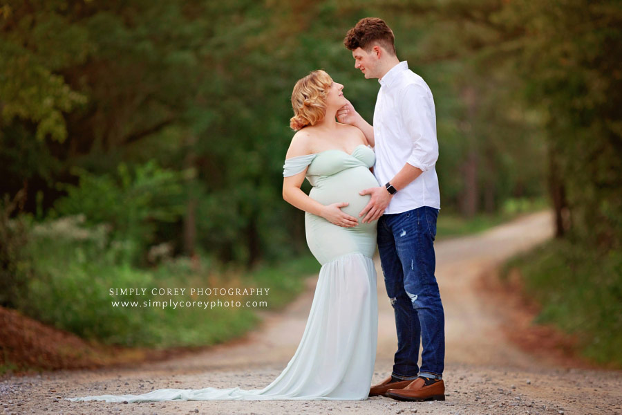 Douglasville maternity photographer, couple outside on dirt road in summer