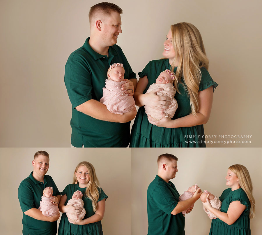 Bremen family photographer, parents holding newborn twin baby girls