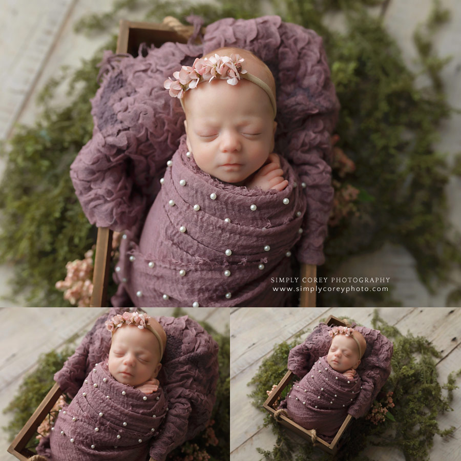 Bremen newborn photographer, baby girl in purple swaddle