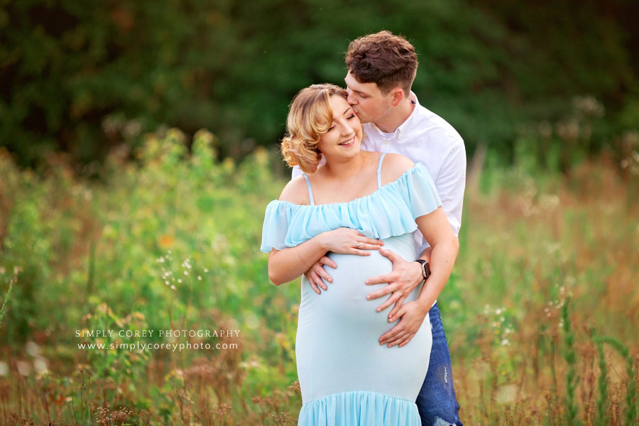 Peachtree City maternity photographer, young couple outside in field