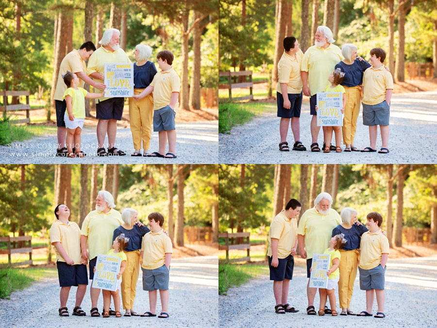 Carrollton family photographer, grandparents and grandkids outside on dirt road