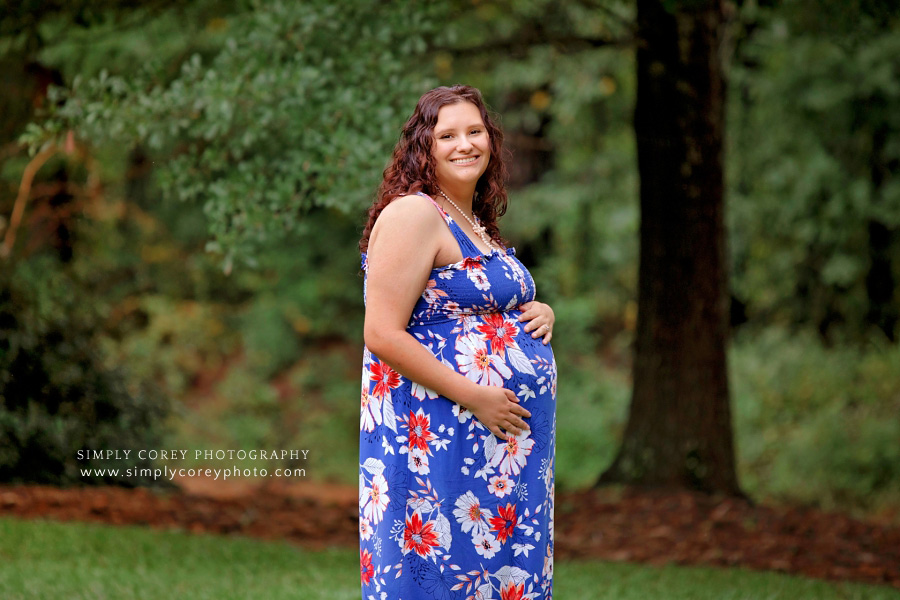 Carrollton Georgia maternity photographer, pregnant mom outside in floral sundress