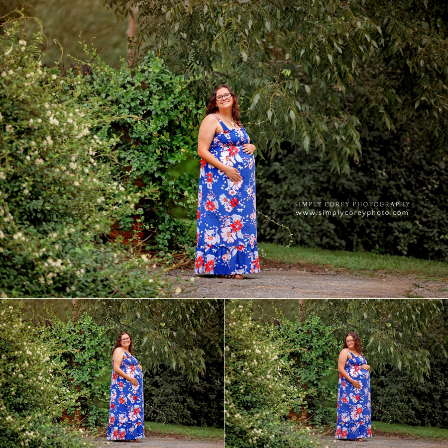 maternity photographer near Villa Rica, expecting mom outside with greenery in a floral sundress