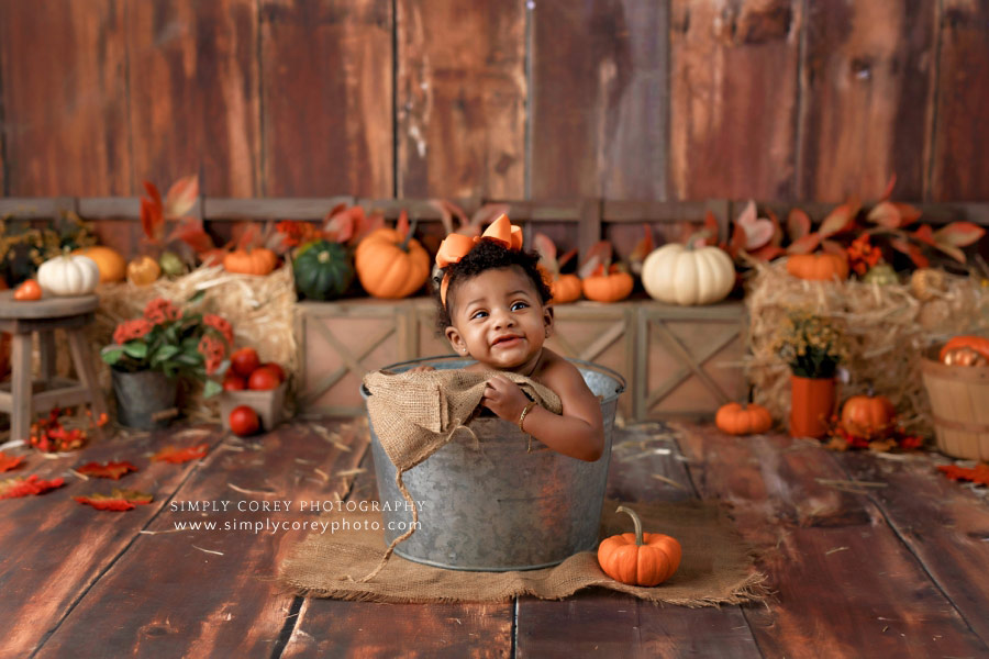 baby photographer near Atlanta, 6 month session for fall with bucket and pumpkins