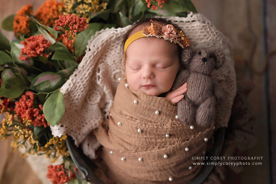 Atlanta newborn photographer, baby girl in fall colors holding teddy bear