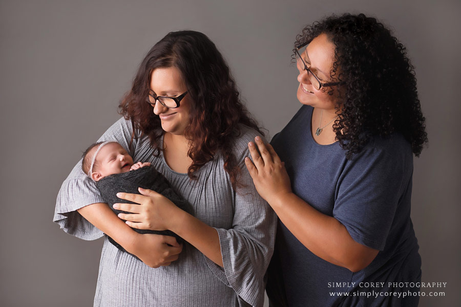 Villa Rica newborn photographer; mom, baby, and grandma on studio backdrop