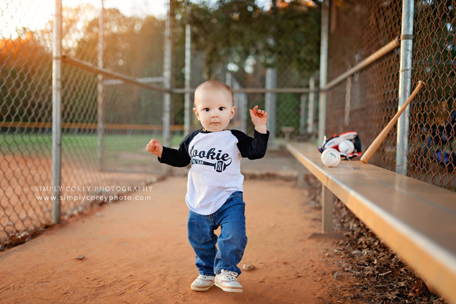 baby photographer near Villa Rica, one year session in baseball dugout