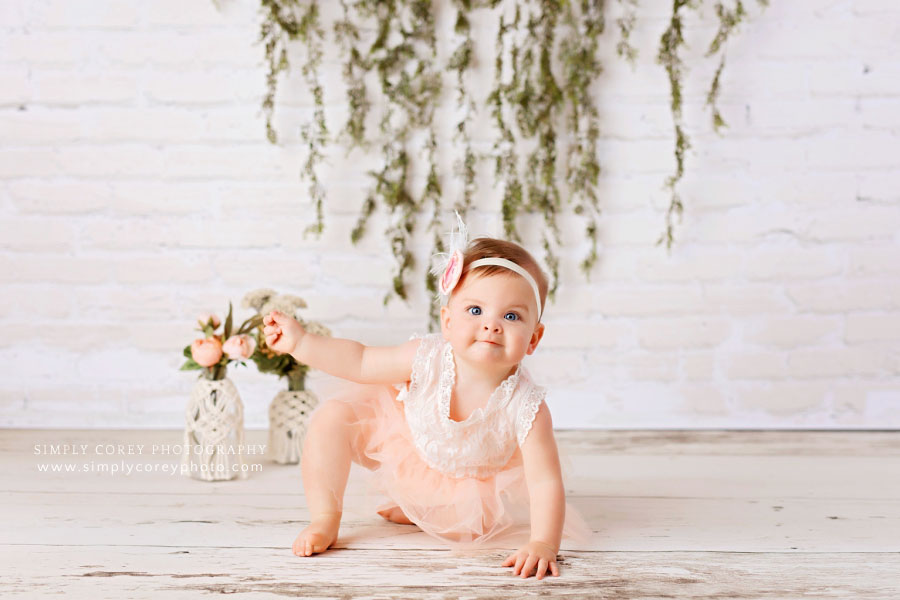 baby photographer near Atlanta, white brick floral studio set for one year session
