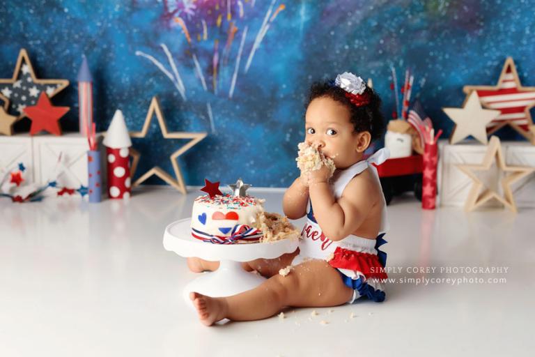 A red, white, and blue firework cake smash for a 4th of July baby