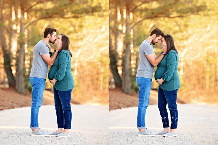 maternity photographer near Atlanta, pregnant couple kissing on country road