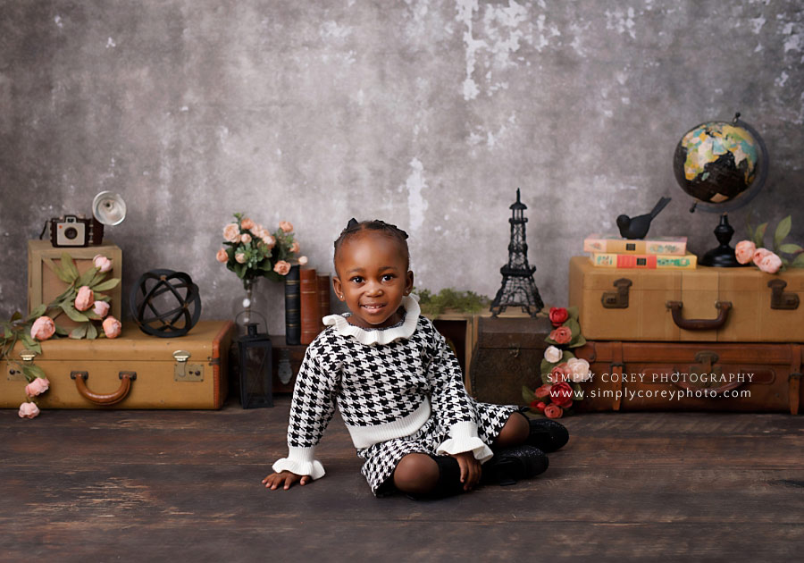baby photographer near Carrollton, GA; portrait of a toddler in houndstooth 