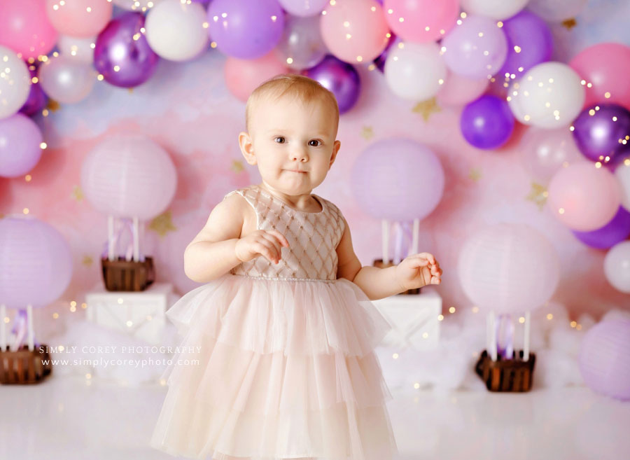 baby photographer near Hiram, girl with hot air balloon studio theme
